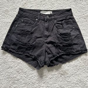 Distressed black denim shorts